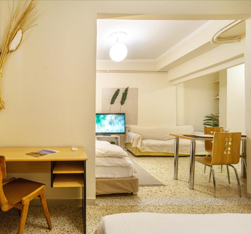 A television and/or entertainment centre at Zacharitsa APT at Acropolis up 4 guests by LODGESPOT