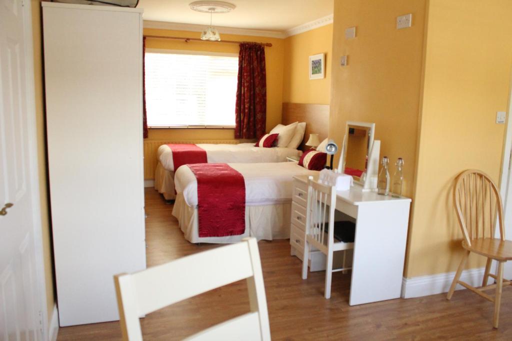 Voodi või voodid majutusasutuse Seacourt Accommodation Tramore - Adult Only toas