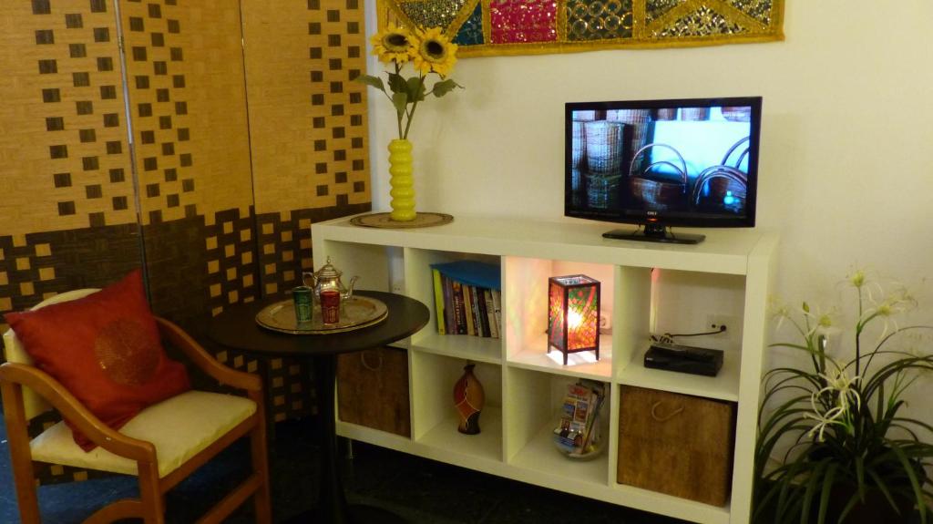 TV a/nebo společenská místnost v ubytování Estudio con encanto