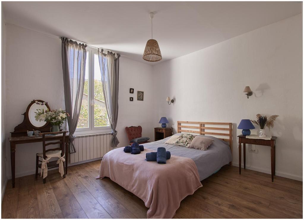 Postel nebo postele na pokoji v ubytování 1001 Ocres