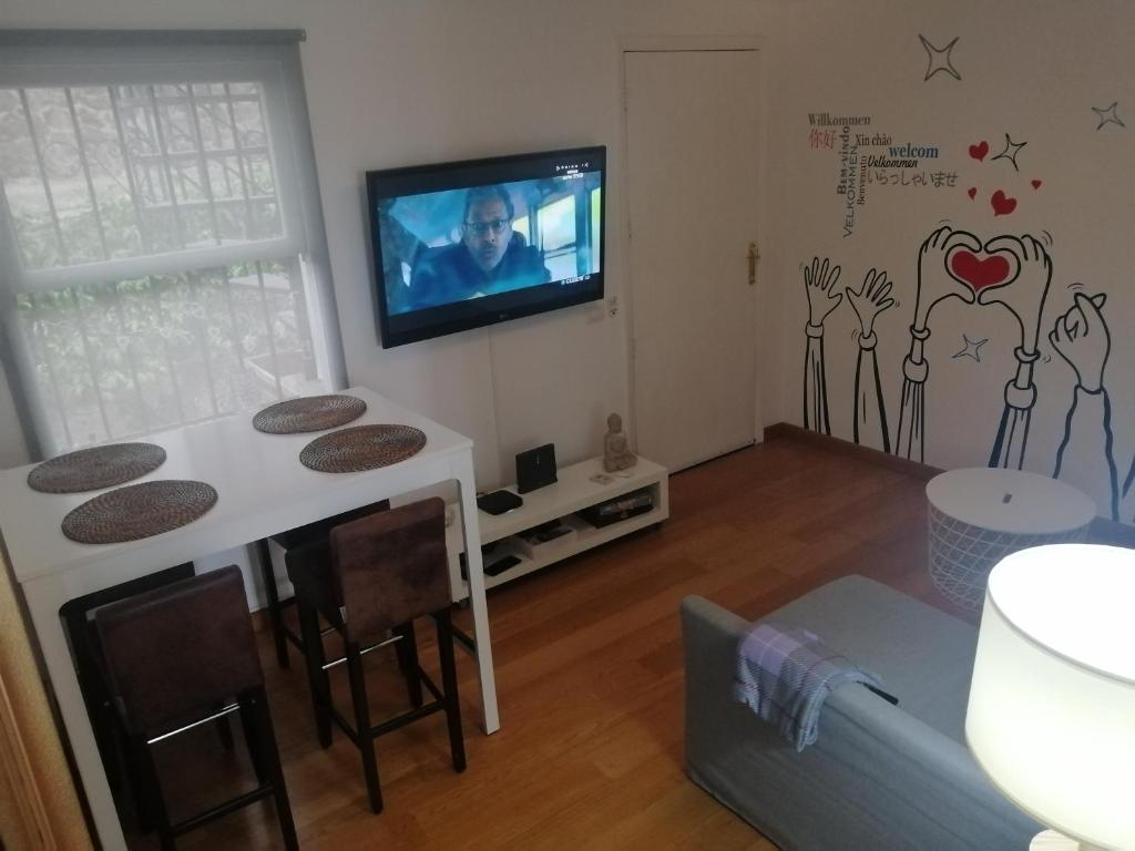 Televízia a/alebo spoločenská miestnosť v ubytovaní Puerto de la Cruz - Sun House - Holidays - Resort