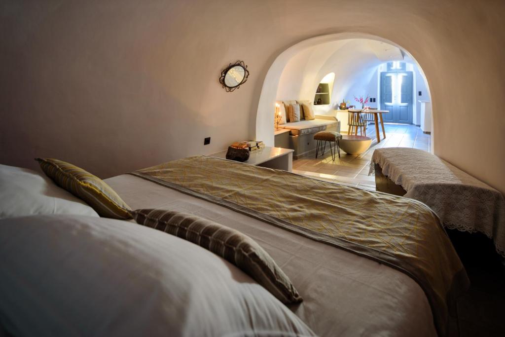 Ένα ή περισσότερα κρεβάτια σε δωμάτιο στο Cave house mARTrona