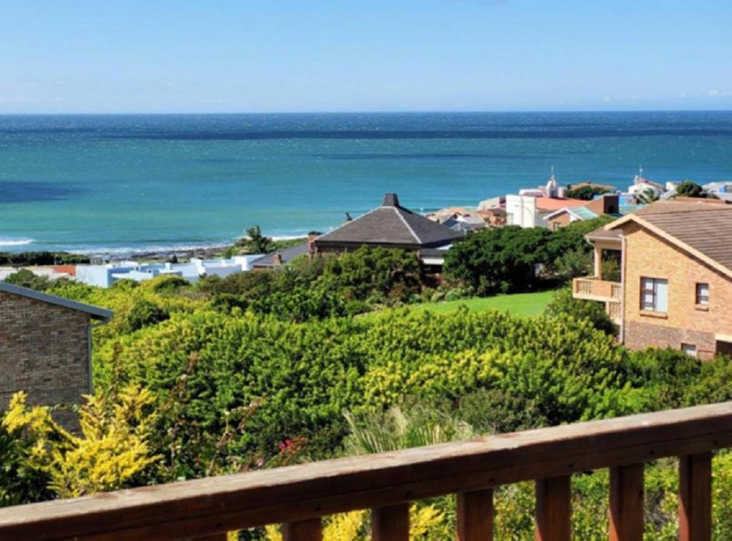 a view of the ocean from a balcony at JBay Surfed Out in Jeffreys Bay