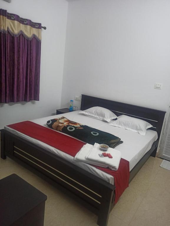 Postel nebo postele na pokoji v ubytování REHMANS HOMESTAY