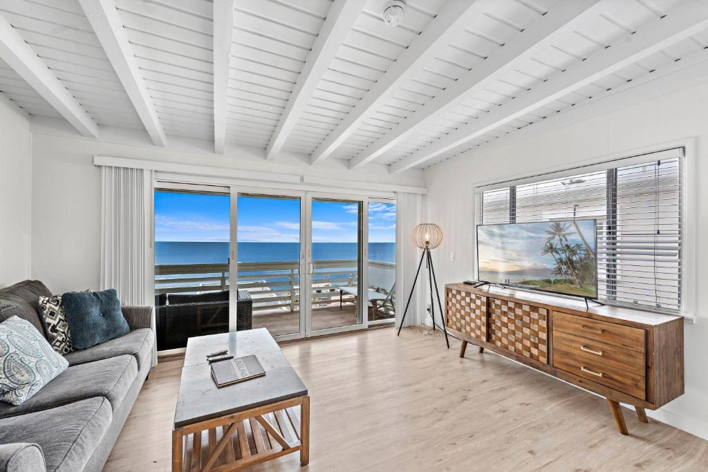 a living room with a view of the ocean at Sleepy Hollow Villas #2 in Laguna Beach in Laguna Beach
