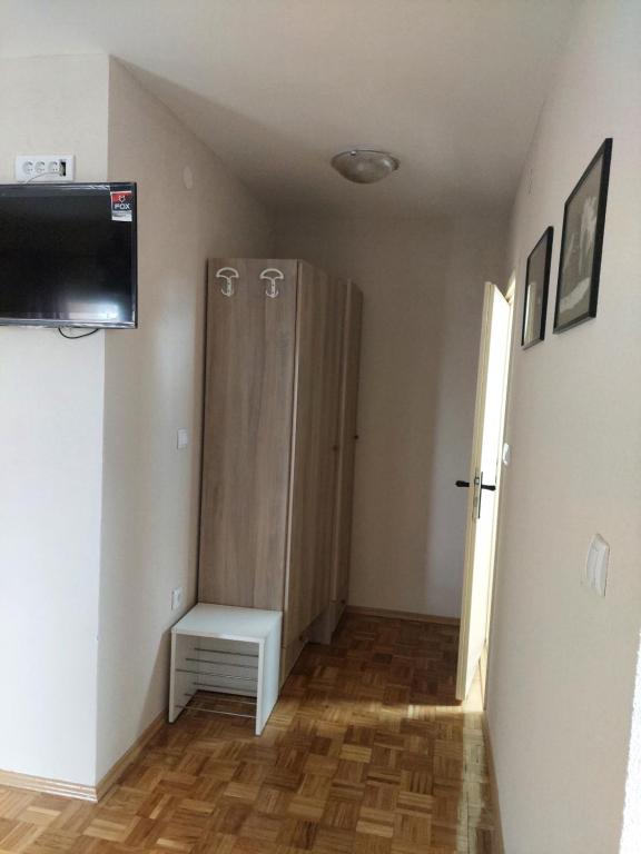 TV a/nebo společenská místnost v ubytování Apartmani Filip