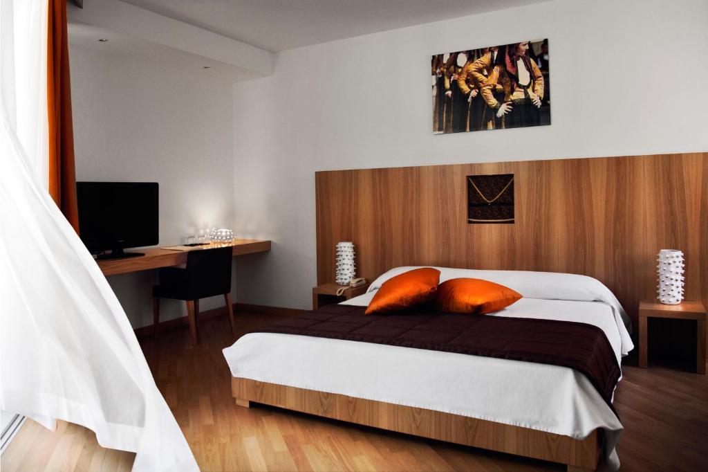Postel nebo postele na pokoji v ubytování Lanthia Resort