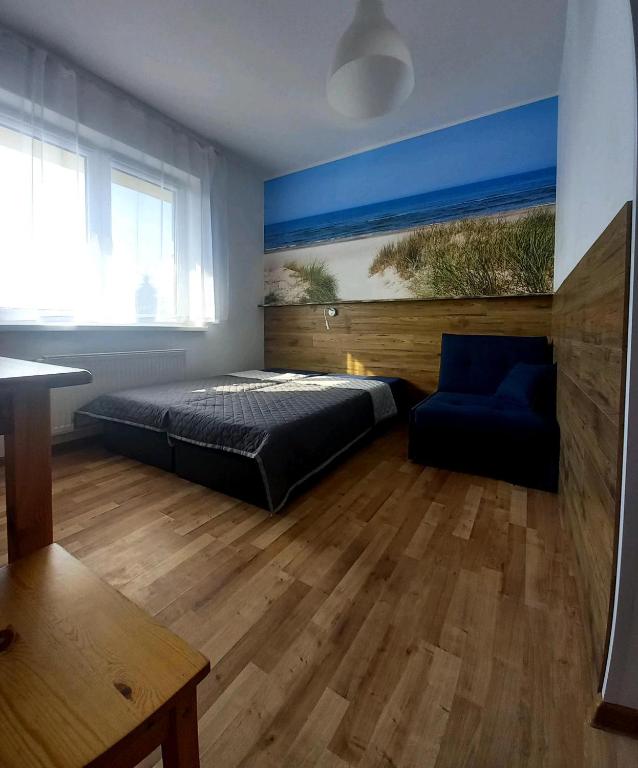 Postel nebo postele na pokoji v ubytování Leśne Zacisze