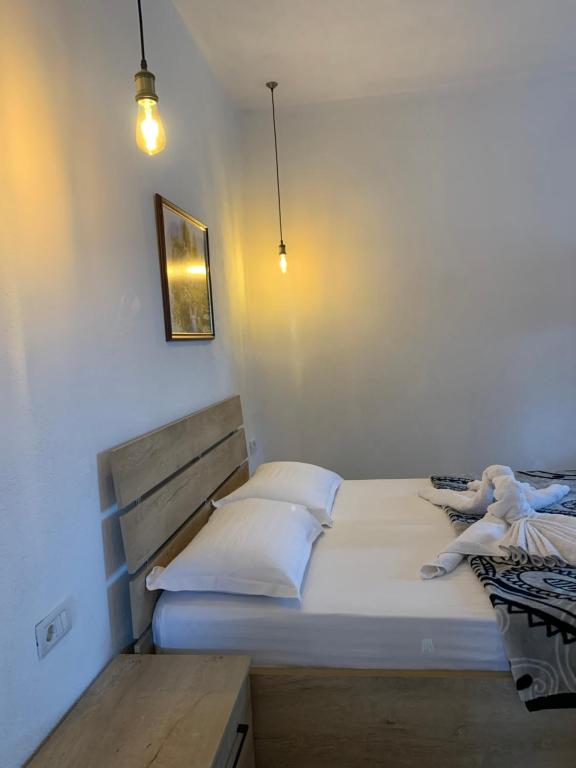Postel nebo postele na pokoji v ubytování Hotel Apostoli