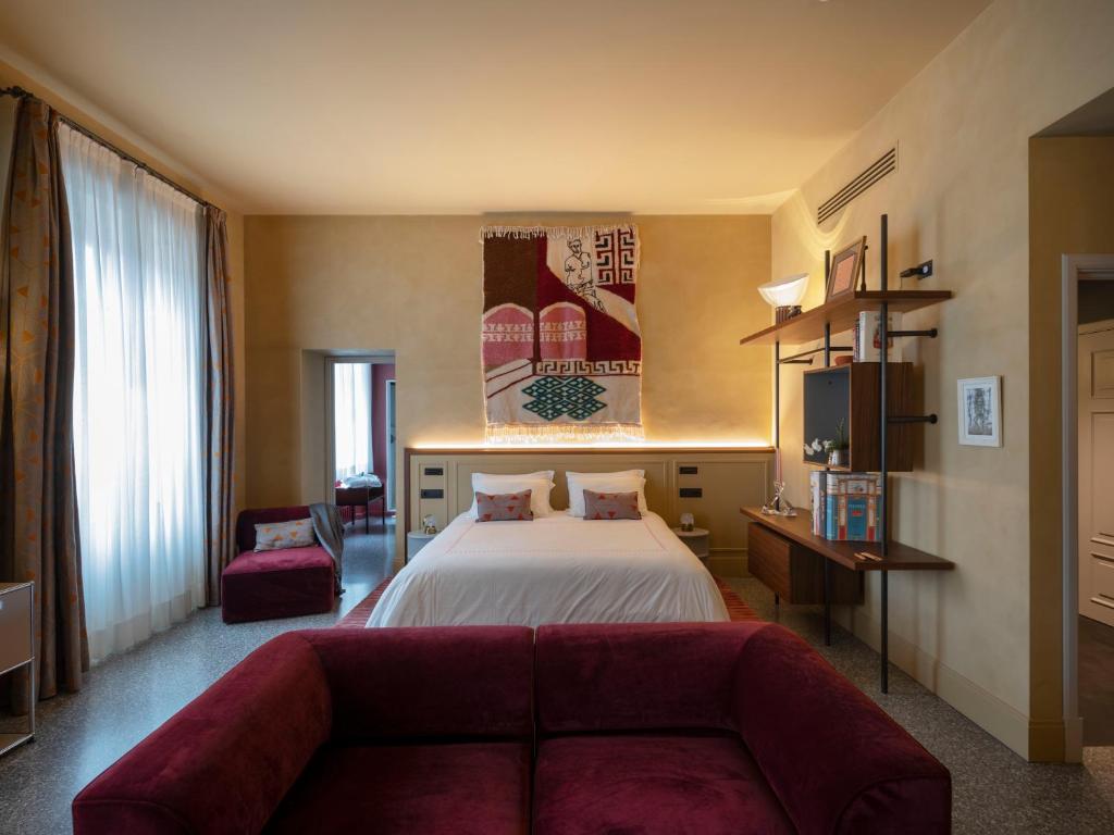 Postel nebo postele na pokoji v ubytování Paradis Pietrasanta