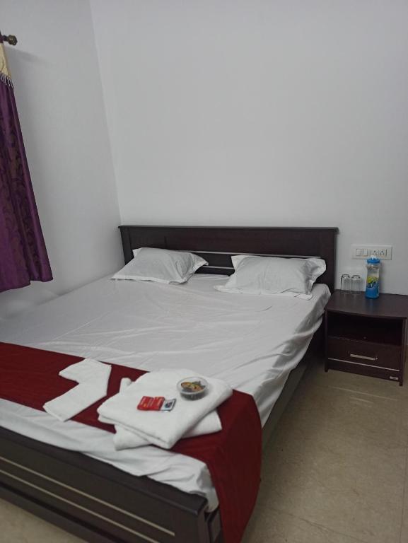 Postel nebo postele na pokoji v ubytování REHMANS HOMESTAY