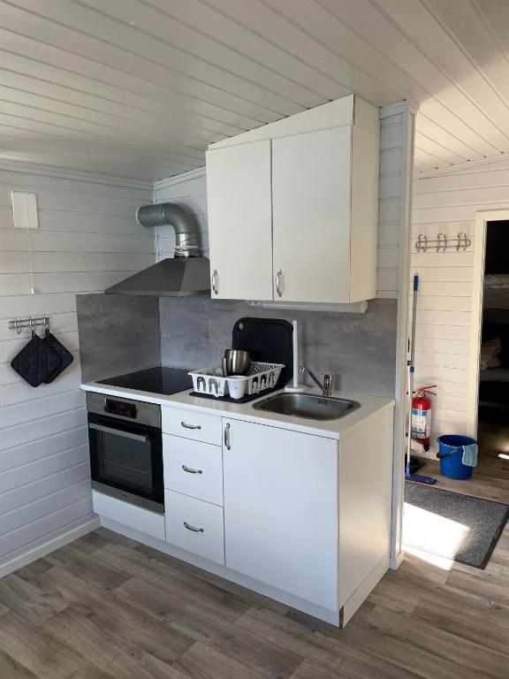 Kuchyň nebo kuchyňský kout v ubytování Skottneset Feriesenter