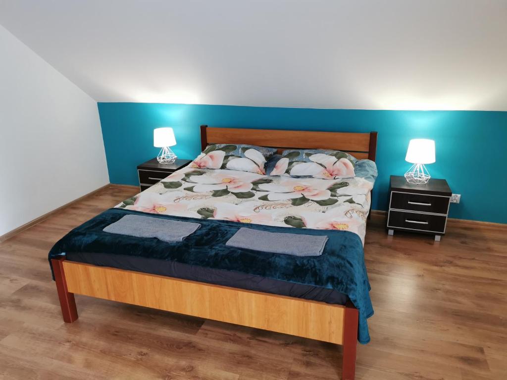 Postel nebo postele na pokoji v ubytování Noclegi przy Wiadukcie - Apartamenty