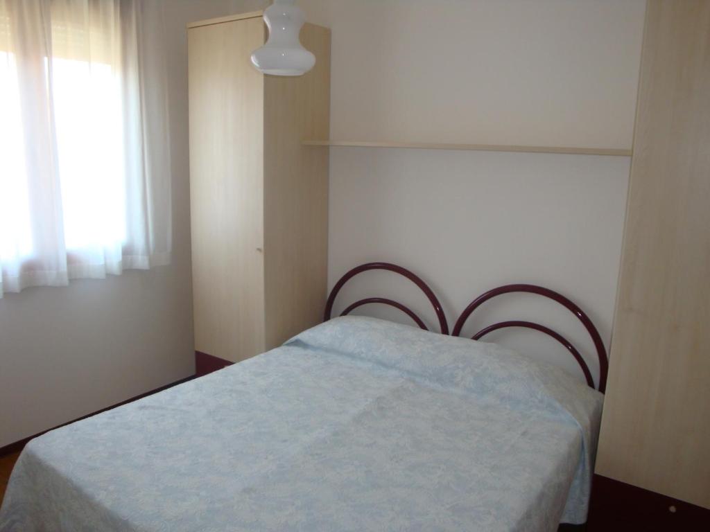 Posteľ alebo postele v izbe v ubytovaní Aurora Residence