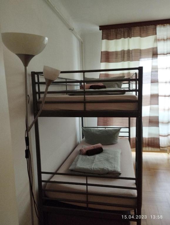Uma cama ou camas num quarto em Graz-Apartments 01
