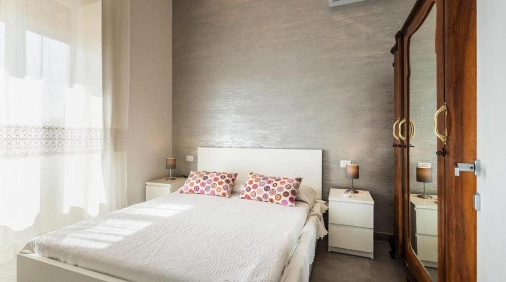 A bed or beds in a room at Casa vacanza il Gelsomino Magico