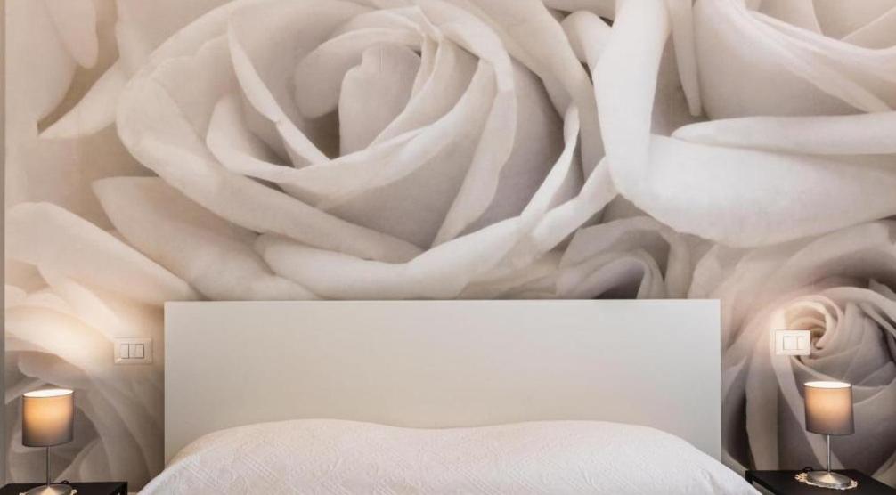 A bed or beds in a room at Casa vacanza il Gelsomino Magico