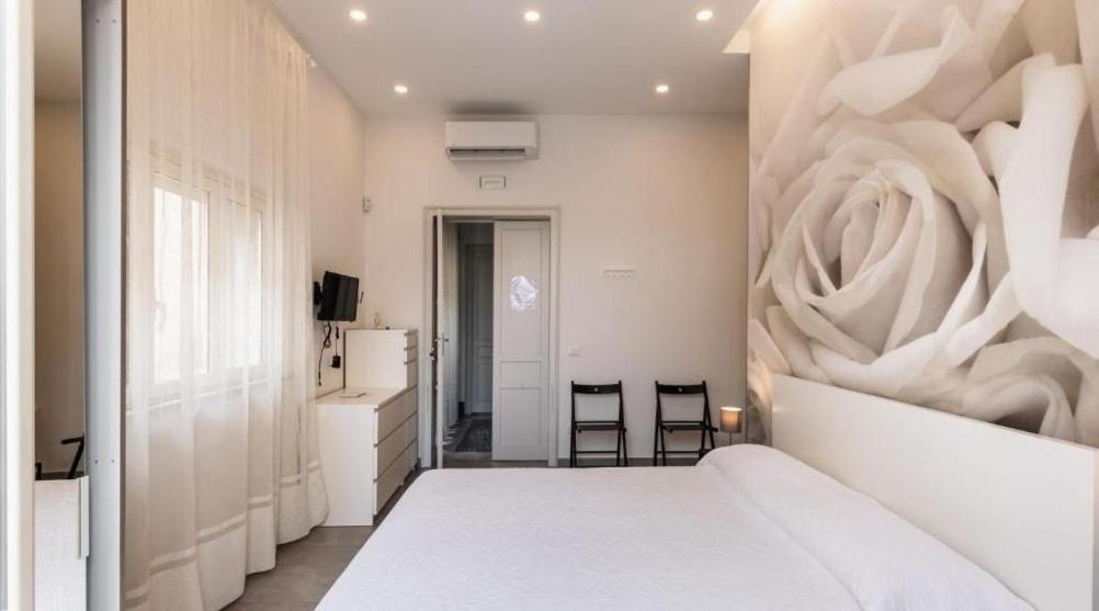 A bed or beds in a room at Casa vacanza il Gelsomino Magico