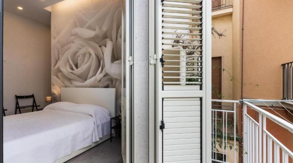 A bed or beds in a room at Casa vacanza il Gelsomino Magico