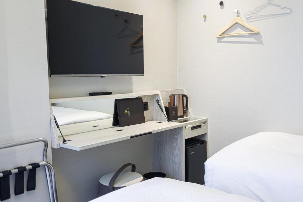 Letto o letti in una camera di Royal Jade Boutique Hotel
