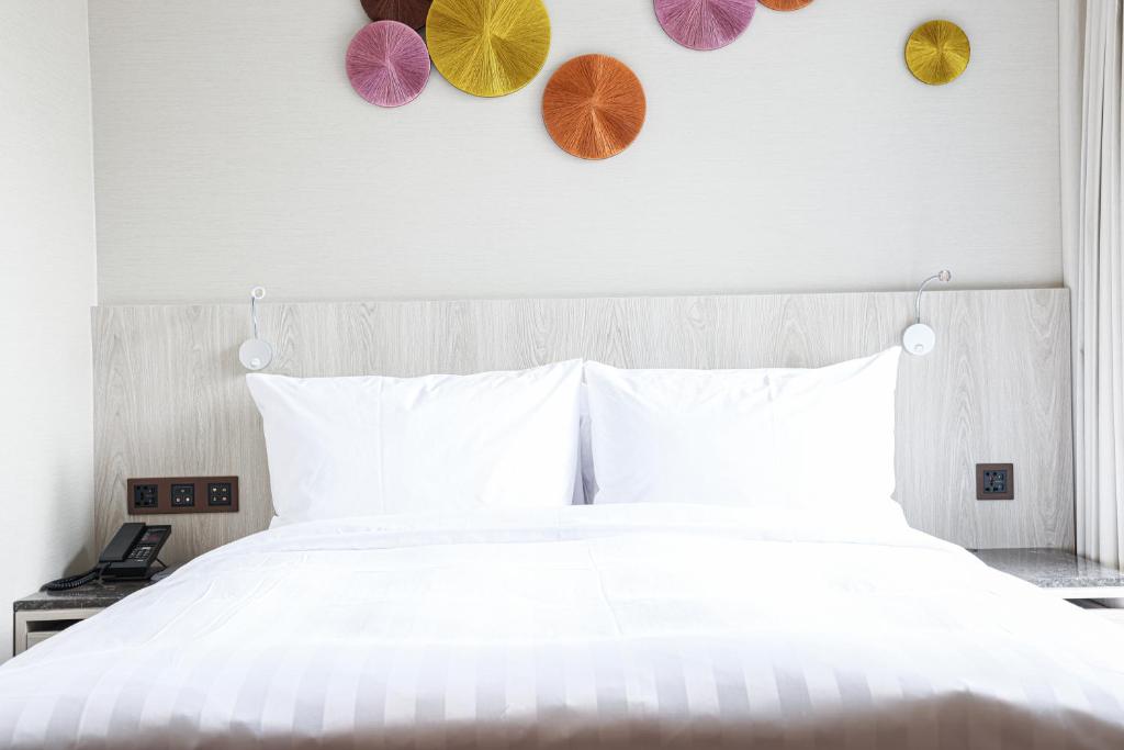 Letto o letti in una camera di Royal Jade Boutique Hotel