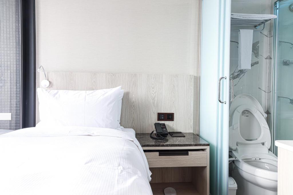 Letto o letti in una camera di Royal Jade Boutique Hotel