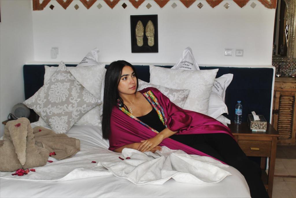 Postel nebo postele na pokoji v ubytování RIAD LUXE LOCATION le GRIZZLY