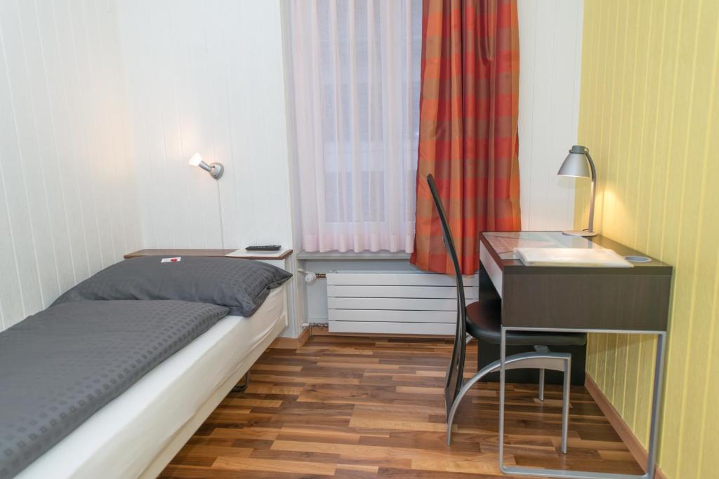 Postel nebo postele na pokoji v ubytování Hotel Rotes Haus