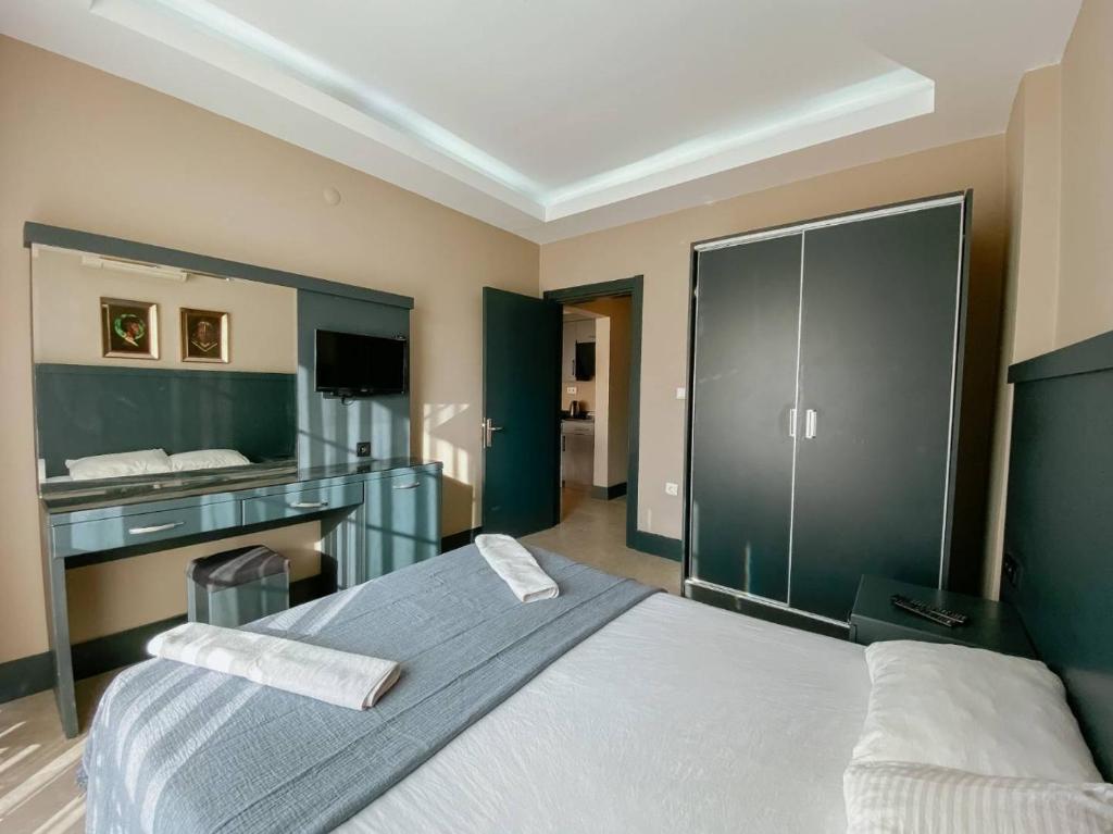 Postel nebo postele na pokoji v ubytování Ölüdeniz 1+1 Modern SummerHouse Wıth Swımmıng Pool