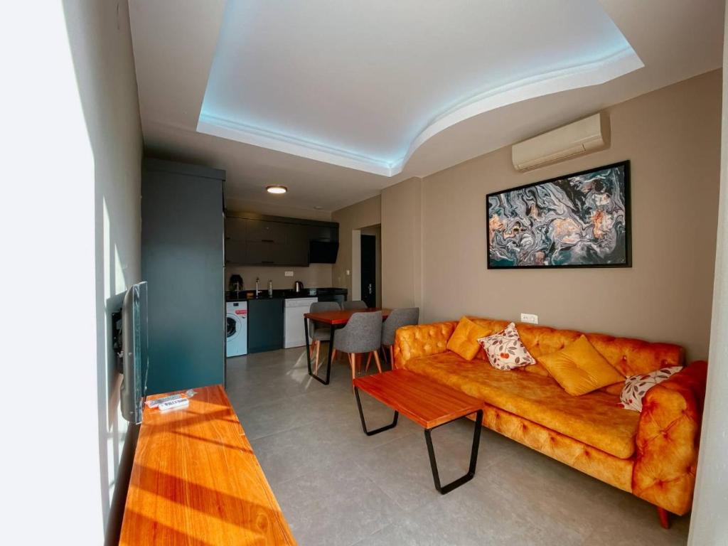 Posezení v ubytování Ölüdeniz 1+1 Modern SummerHouse Wıth Swımmıng Pool