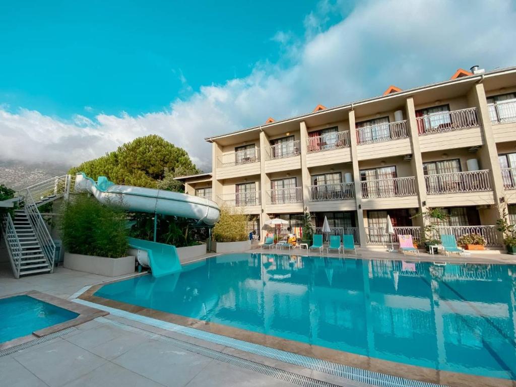 Bazén v ubytování Ölüdeniz 1+1 Modern SummerHouse Wıth Swımmıng Pool nebo v jeho okolí