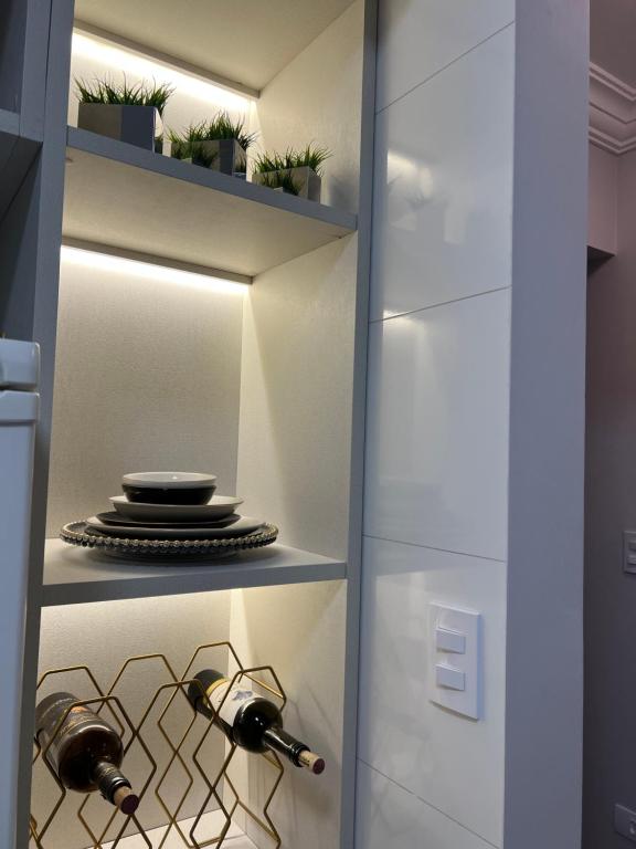Kuchyň nebo kuchyňský kout v ubytování Flat Excepcional no Centro de Capivari