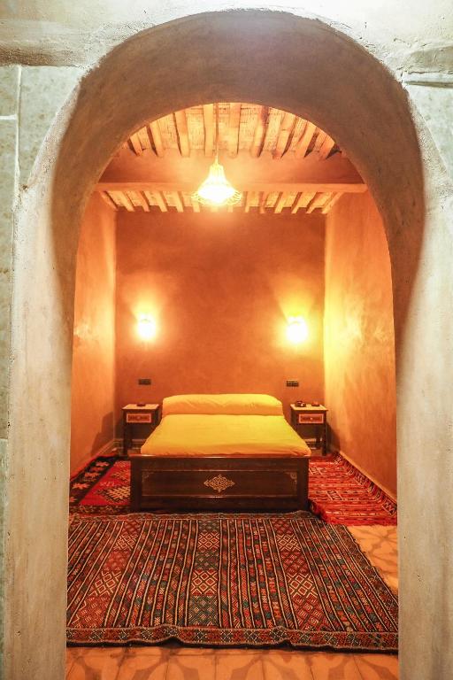 Voodi või voodid majutusasutuse Riad Imuhar toas