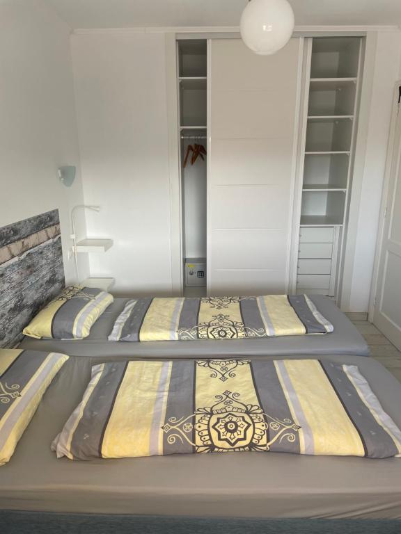 Postel nebo postele na pokoji v ubytování Residencia MIRAPUERTO