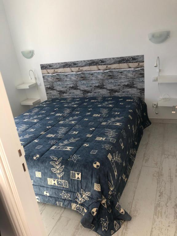 Postel nebo postele na pokoji v ubytování Residencia MIRAPUERTO