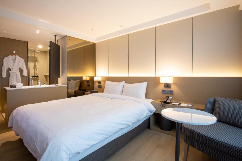 Postel nebo postele na pokoji v ubytování Hotel Interburgo Exco