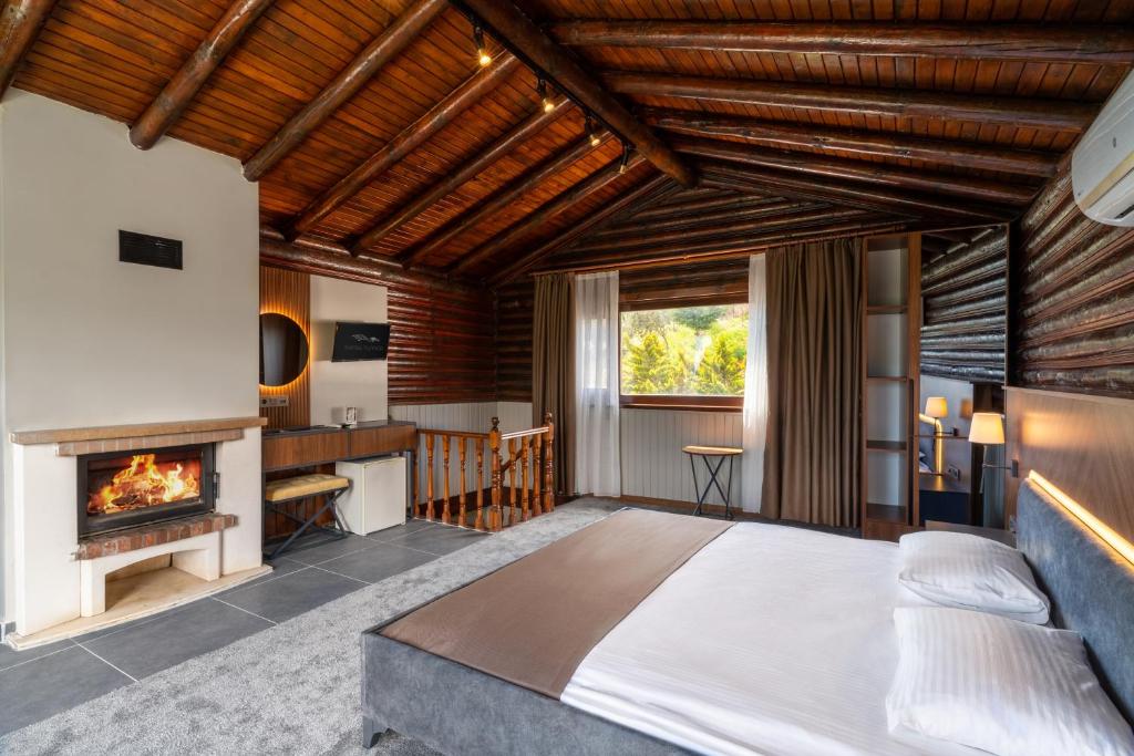 Postel nebo postele na pokoji v ubytování Assos Kartal Yuvasi Hotel