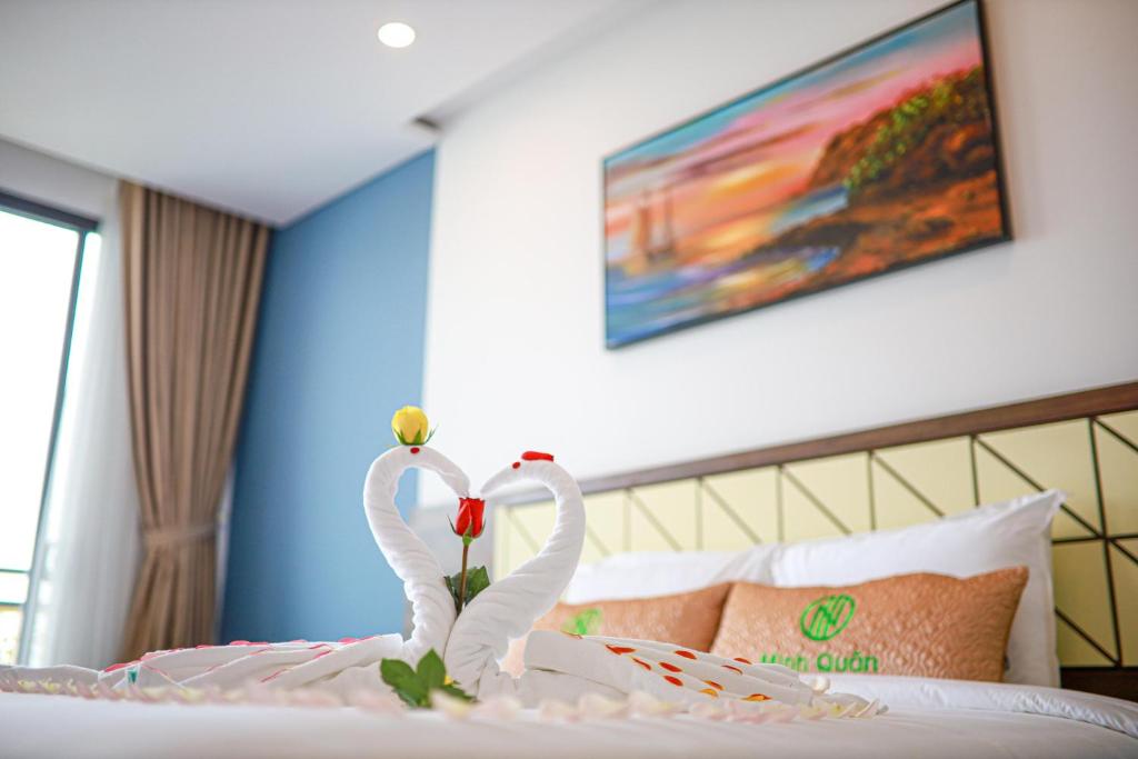 Postel nebo postele na pokoji v ubytování Minh Quan Hotel - Da Nang Center By HOS