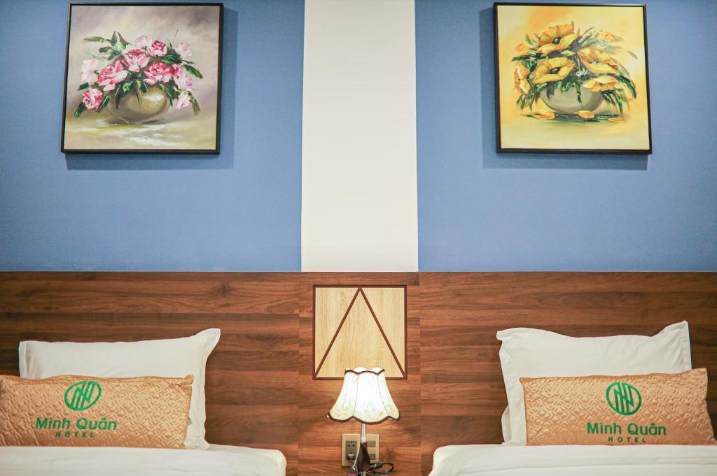 Postel nebo postele na pokoji v ubytování Minh Quan Hotel - Da Nang Center By HOS