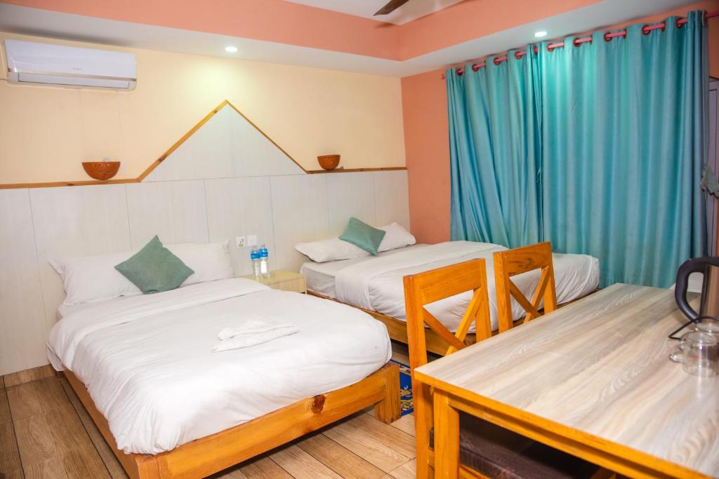 Cama o camas de una habitación en Hotel Olympus Pokhara