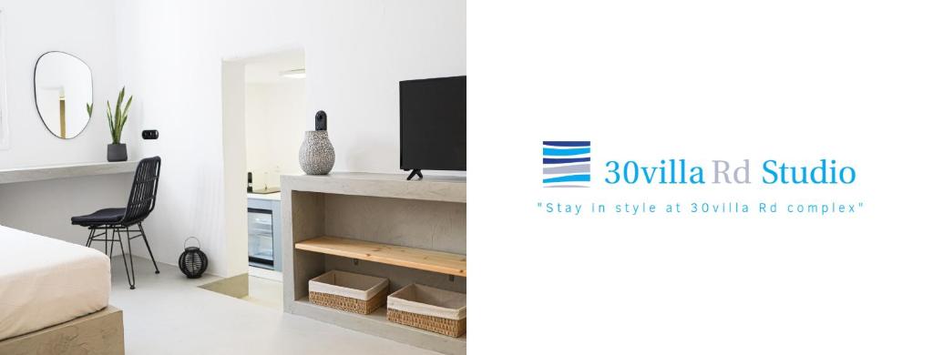 Telewizja i/lub zestaw kina domowego w obiekcie 30villa Rd Studio
