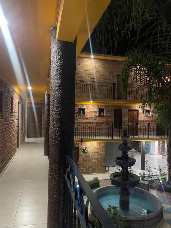 a courtyard with a fountain in a building at HOTEL BOUTIQUE JAYCO in San José Iturbide