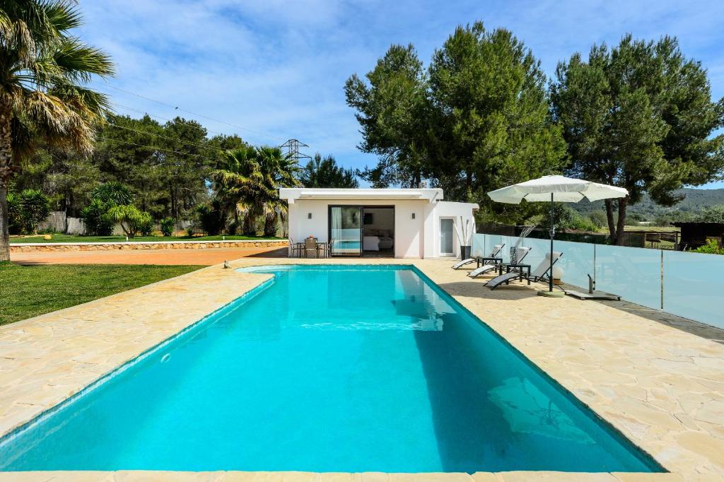 an image of a swimming pool at a house at Can Maruna in Sant Joan de Labritja
