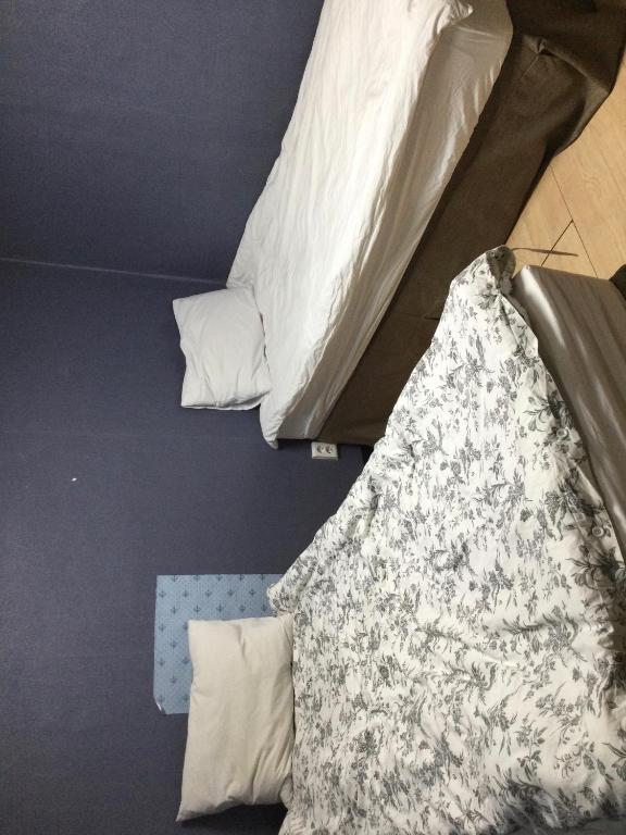 Postel nebo postele na pokoji v ubytování G Mini Hotel Dongdaemun