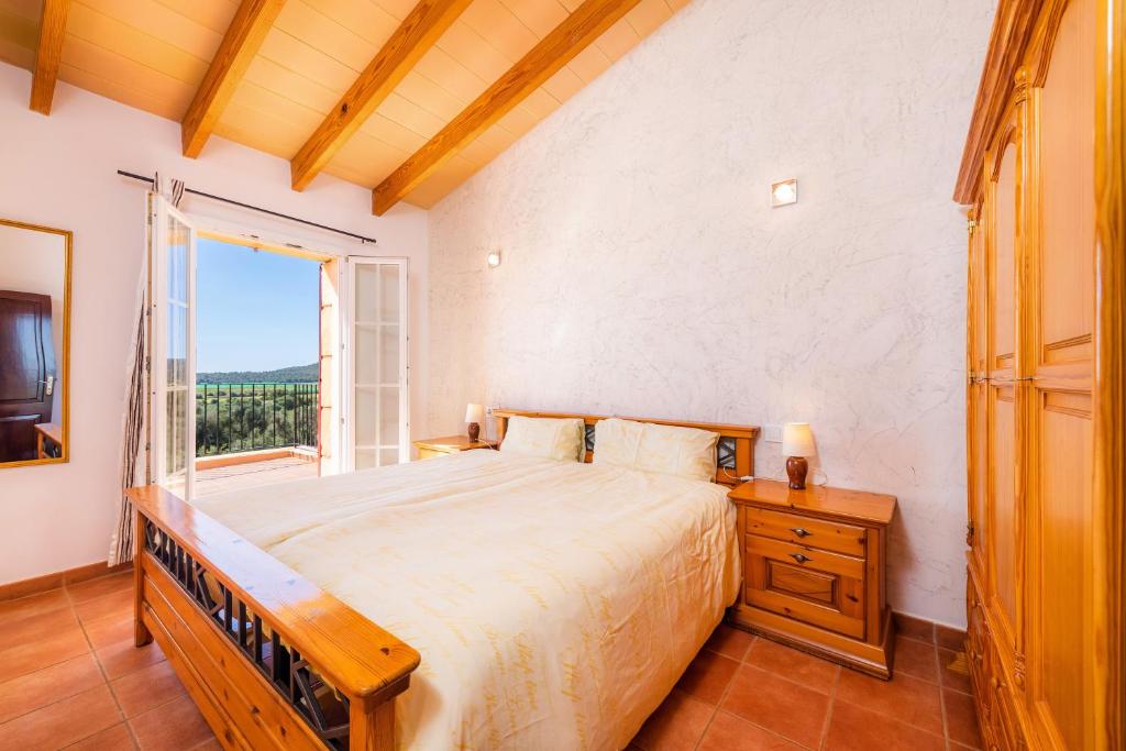 A bed or beds in a room at Maria