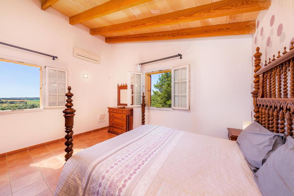 A bed or beds in a room at Maria