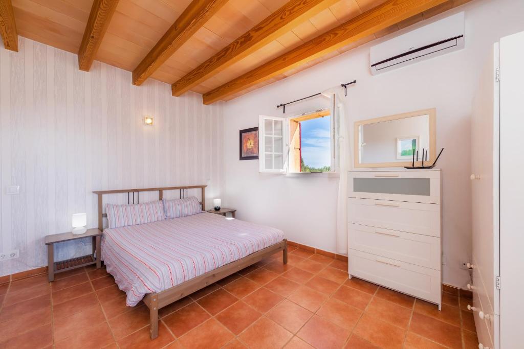 A bed or beds in a room at Maria