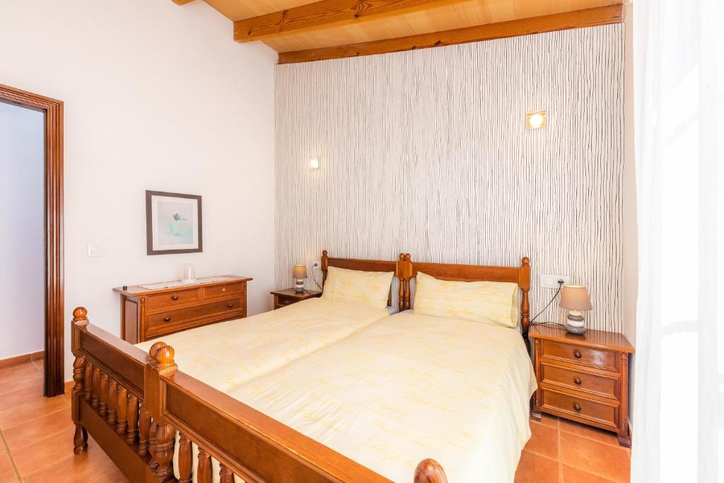 A bed or beds in a room at Maria