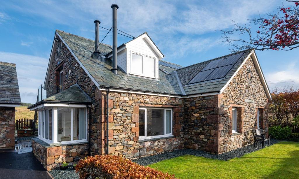 a house with solar panels on the roof at Sherriff in Penrith