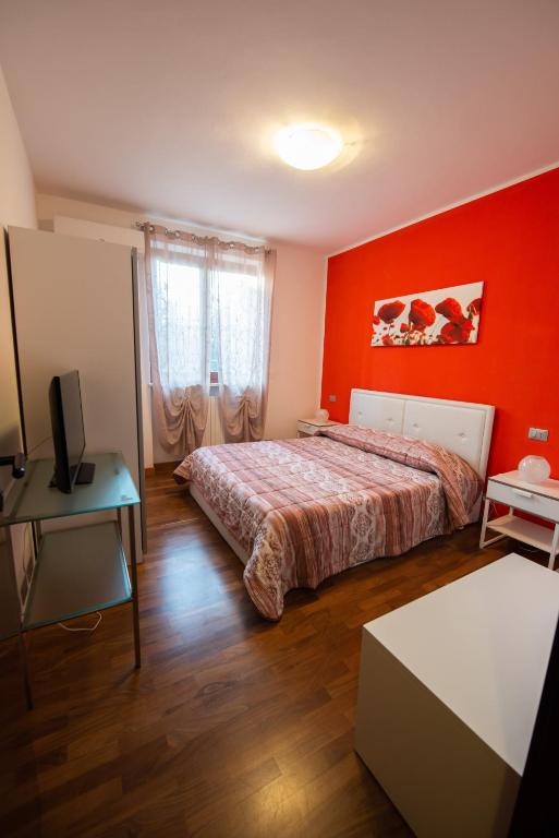 A bed or beds in a room at Le Palme Sona